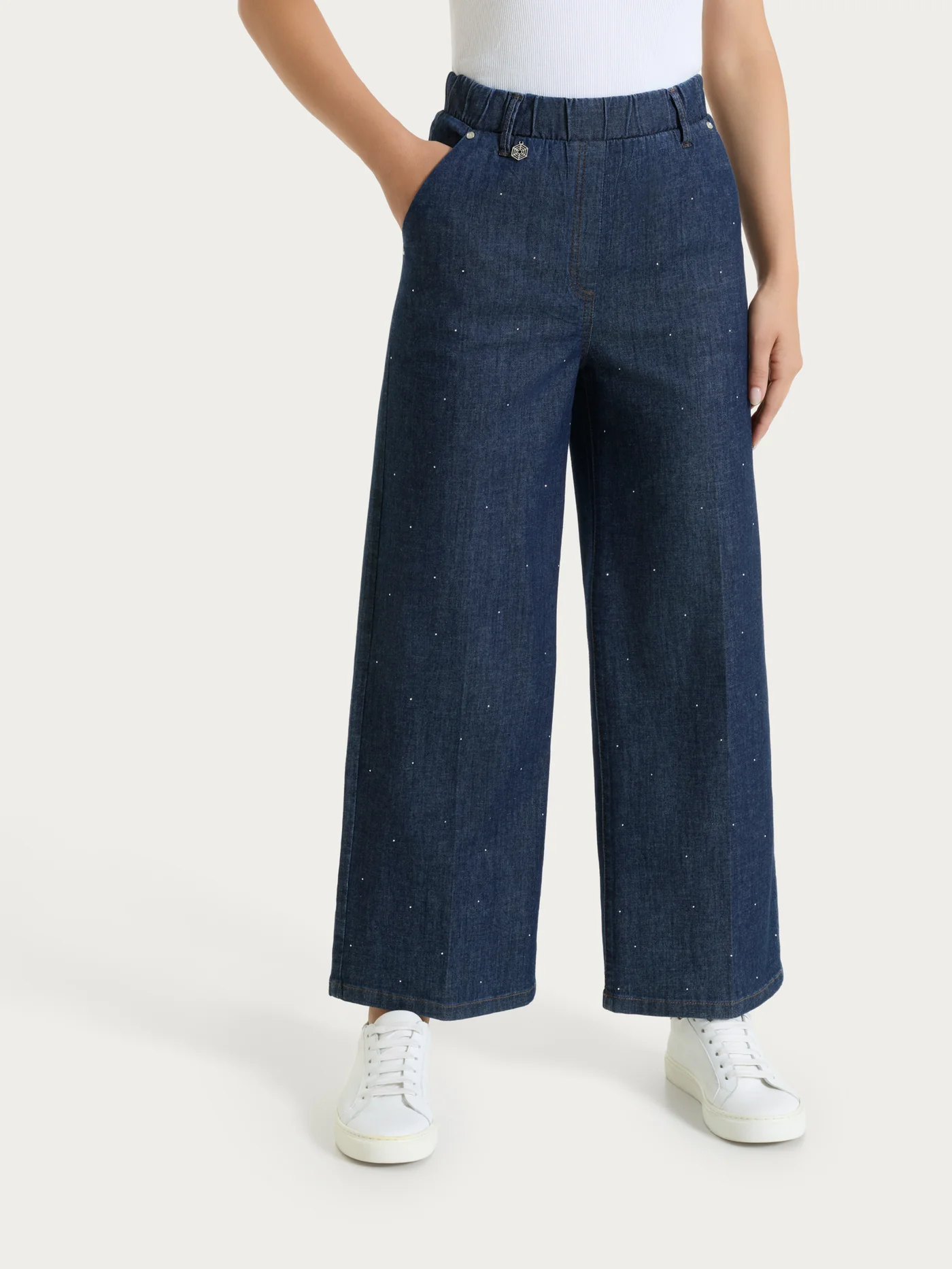 JEANS AMPIO ALLA CAVIGLIA CON STRASS-RAGNO(42/52)